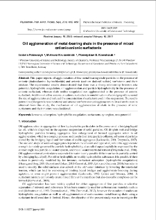 Oil agglomeration of metal-bearing shale in the presence of mixed cationic-anionic surfactants