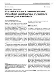 2D numerical analysis of the seismic response of a karst rock mass: importance of underground caves and geostructural details