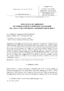 Influence of adhesion on stress-strain condition alongside of a full column resin cartridge rock bolt